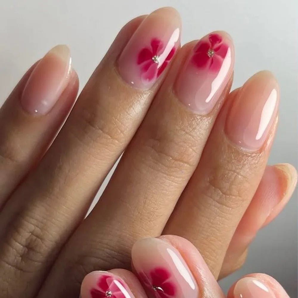 Luxury floral press on nails featuring elegant floral designs and a gel-finish manicure, perfect for stylish occasions.