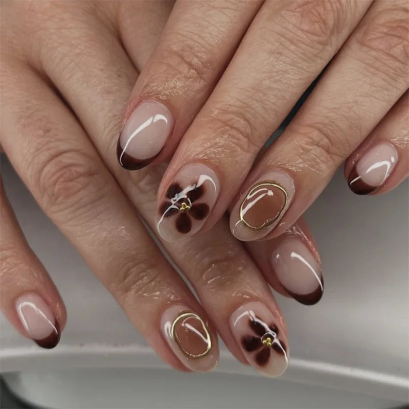 Luxury floral press on nails featuring elegant floral designs and a gel-finish manicure, perfect for stylish occasions.